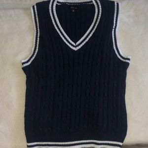 Blue vest, brand Love Tree
it is in good used condition